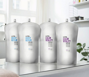 KMS MOISTREPAIR and COLORVITALITY pouches in a bright salon setting